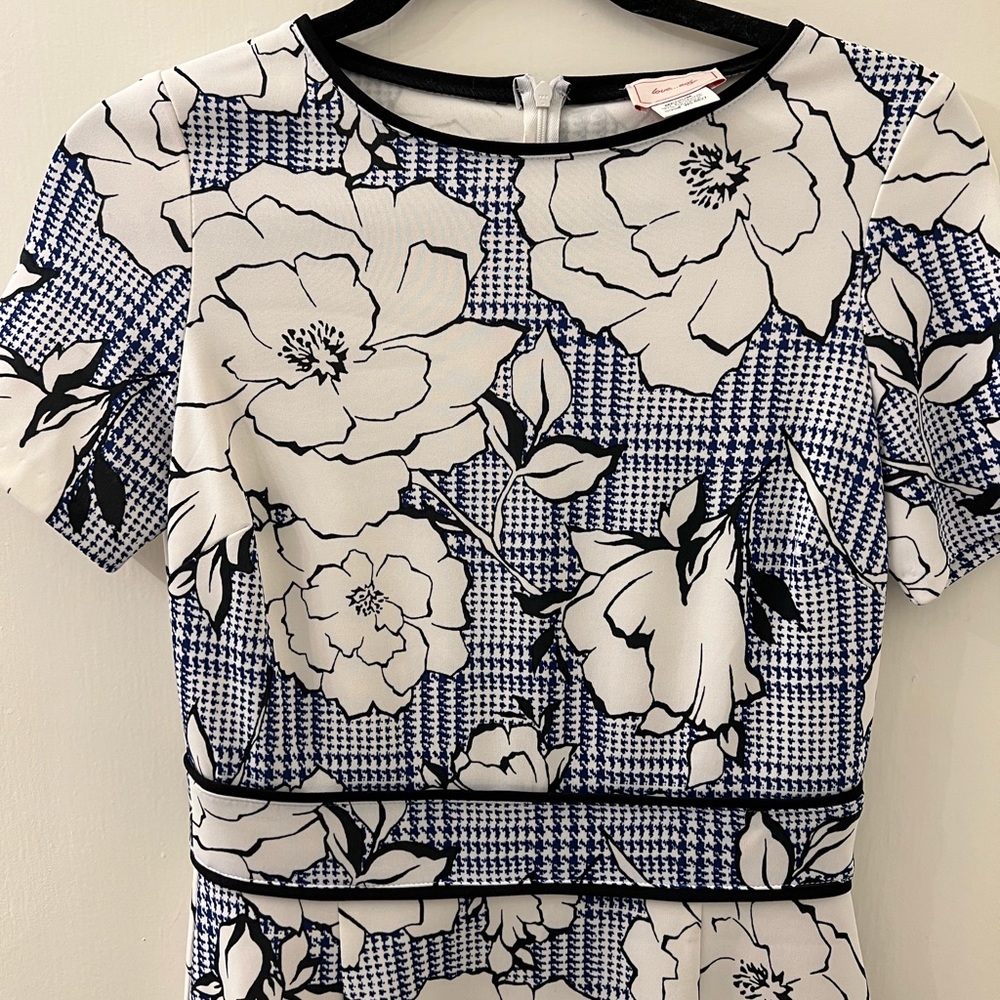 Love…ady blue and black peplum style dress